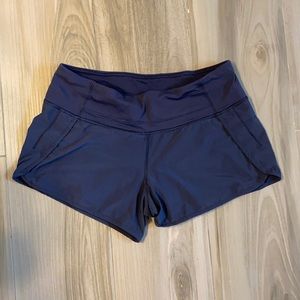 Navy women’s 4 inch speed up mid-rise